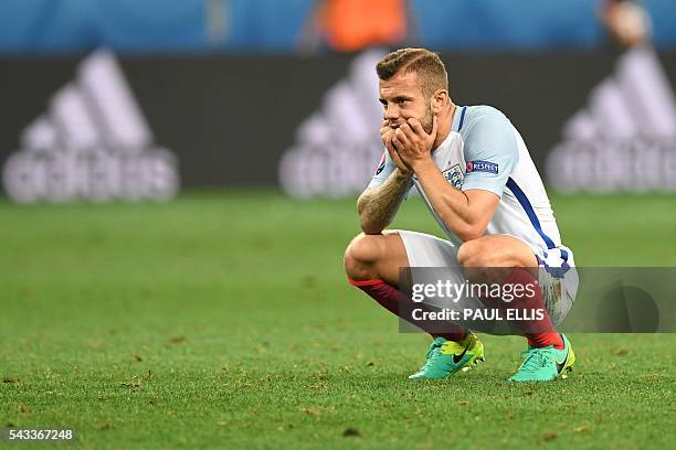 England's midfielder Jack Wilshere reacts after England lost 1-2 to Iceland in the Euro 2016 round of 16 football match between England and Iceland...