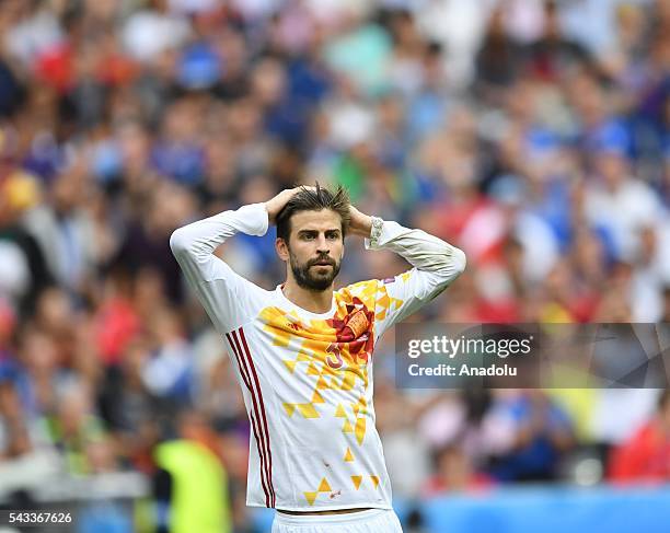 Gerard Pique of Spain reacts during the UEFA Euro 2016 round of 16 football match between Italy and Spain at Stade de France in Paris, France on June...