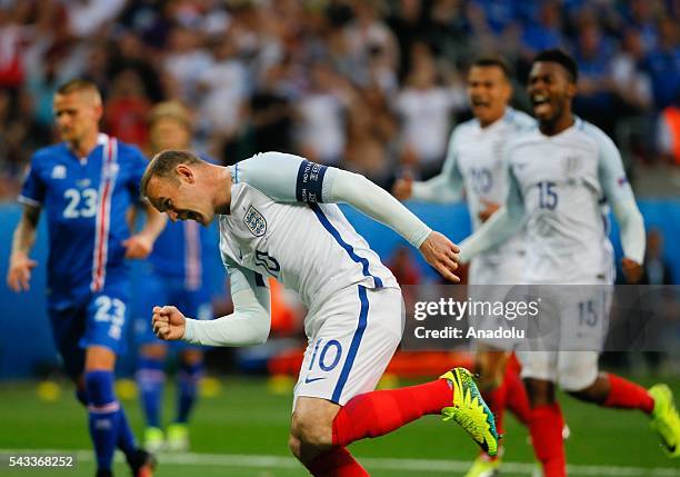 Wayne Rooney of England celebrates after scoring a goal during the UEFA Euro 2016 Round of 16 football match between Iceland and England at Stade de...