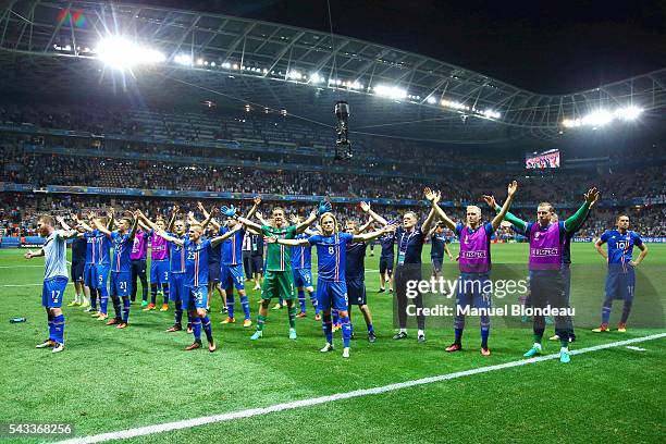 Team of Iceland celebrate at the end of the match during the European Championship match Round of 16 between England and Iceland at Allianz Riviera...