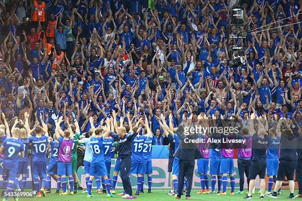 Iceland supporters celebrate their team's 2-1 win after the UEFA EURO 2016 round of 16 match between England and Iceland at Allianz Riviera Stadium...