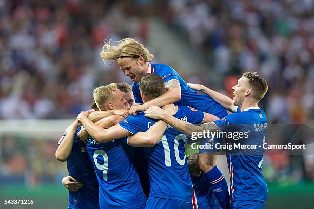 Iceland's Kolbeinn Sigthorsson celebrates scoring his sides second goal with team mates during the UEFA Euro 2016 Round of 16 match between England...