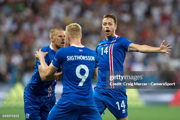 Iceland's Kolbeinn Sigthorsson celebrates scoring his sides second goal with team mate Kari Arnason during the UEFA Euro 2016 Round of 16 match...