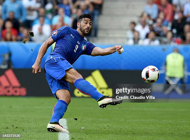 Graziano Pelle of Italy scores his team's second goal during the UEFA EURO 2016 round of 16 match between Italy and Spain at Stade de France on June...