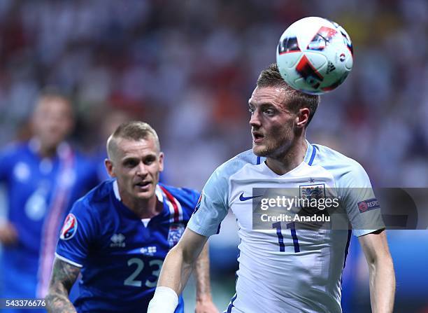 Jamie Vardy of England in action against Ari Skulason of Iceland during the UEFA Euro 2016 Round of 16 football match between Iceland and England at...