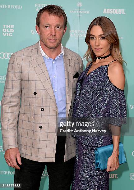 Jacqui Ainsley and Guy Ritchie attend The Old Vic Summer Gala at The Brewery on June 27, 2016 in London, England.