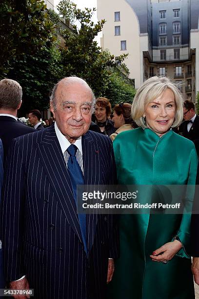 Mohamed Al-Fayed and his wife Heini Wathen attend the "Colonne Vendome" Is Unveiled After Restoration Works on June 27, 2016 in Paris, France.