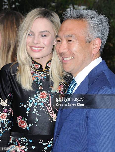 Actress Margot Robbie and CEO of Warner Bros. Entertainment Kevin Tsujihara attend the premiere of Warner Bros. Pictures' 'The Legend Of Tarzan' at...