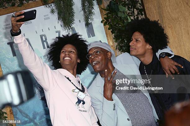 Dancers Les Twins pose for a selfie with actor Samuel L. Jackson at the premiere of Warner Bros. Pictures' "The Legend of Tarzan" at the Dolby...