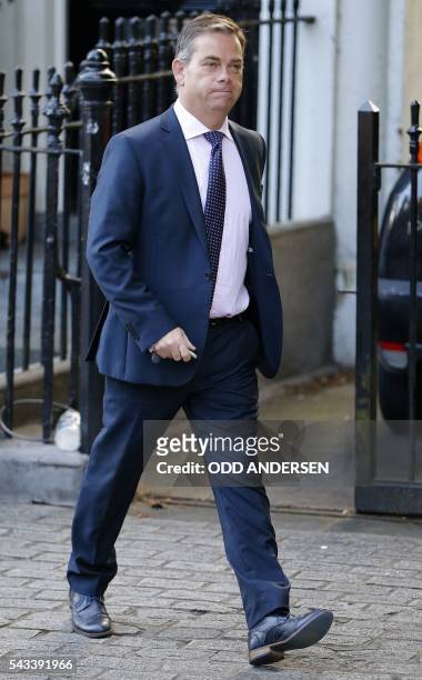 Conservative MP Nigel Adams leaves the home of former London mayor and Brexit campaigner Boris Johnson in London on June 28, 2016. - EU leaders...