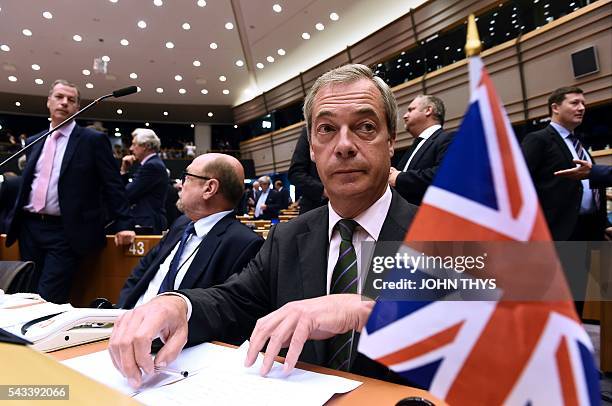 United Kingdom Independence Party leader Nigel Farage sits at the European Union headquarters in Brussels on June 28, 2016 for a meeting with EU...