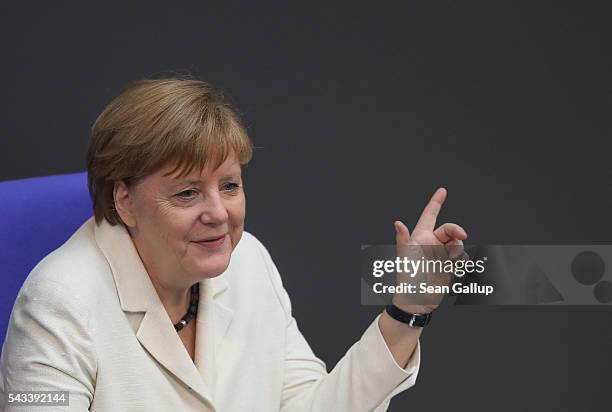 German Chancellor Angela Merkel listens to debates after she addressed the Bundestag with a government declaration on the recent Brexit vote on June...