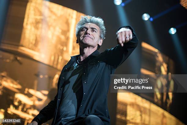 Luciano Ligabue performing live at Pala Alpitour for his "Mondovisione Tour" 2015. Luciano Ligabue, commonly known as Ligabue, is an Italian...