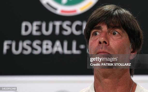 Germany's head coach Joachim Loew addresses a press conference at Germany's training grounds in Evian, eastern France, on June 28 during the Euro...