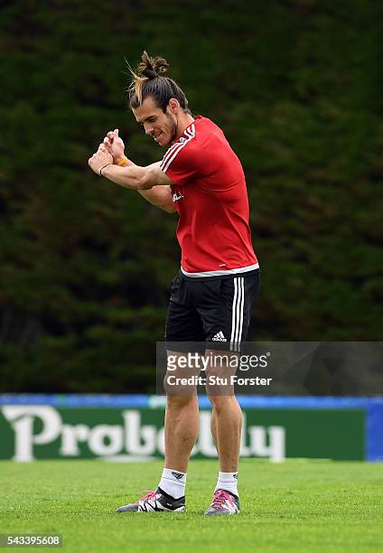 Wales player Gareth Bale practices his golf swing during Wales training at their Euro 2016 base camp ahead of their Quarter Final match against...