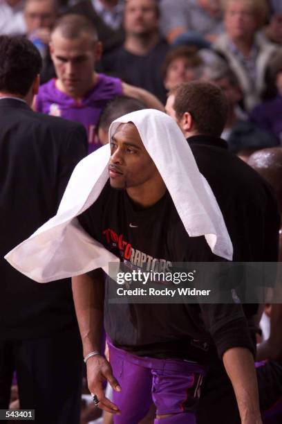 Vince Carter of the Toronto Raptors watches from the sidelines as the Sacramento Kings beat the Toronto Raptors 95-86 at ARCO Arena in Sacramento,...