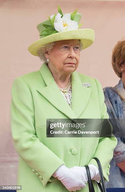 Queen Elizabeth II & Prince Philip, Duke Of Edinburgh attend the unveiling of the Robert Quigg VC memorial statue in Bushmills village on June 28,...