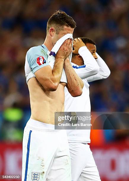 Gary Cahill of England shows his dejection after his team's 1-2 defeat in the UEFA EURO 2016 round of 16 match between England and Iceland at Allianz...