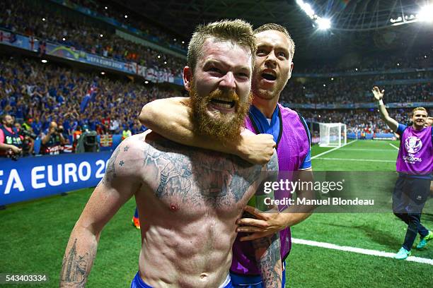 Aron Gunnarsson of Iceland celebrates at the end of the match during the European Championship match Round of 16 between England and Iceland at...