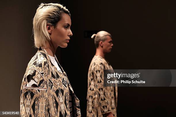 Models pose at the Vektor show during the Mercedes-Benz Fashion Week Berlin Spring/Summer 2017 at Stage at me Collectors Room on June 28, 2016 in...