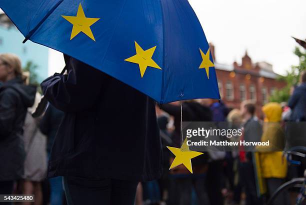 An EU umbrella is seen during an anti-Brexit rally on June 28, 2016 in Cardiff, Wales. The protest is at a time of economic and political uncertainty...