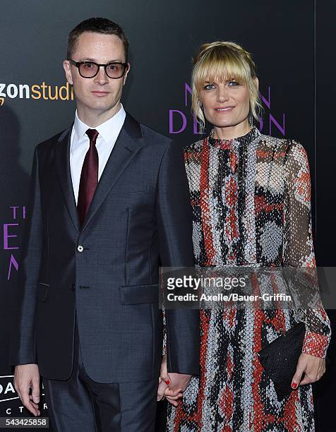 Director Nicolas Winding Refn and wife Liv Corfixen arrive at the premiere of Amazon's 'The Neon Demon' at ArcLight Cinemas Cinerama Dome on June 14,...