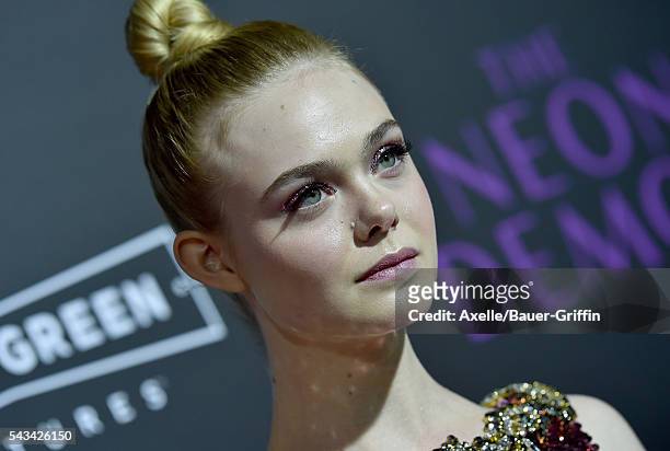 Actress Elle Fanning arrives at the premiere of Amazon's 'The Neon Demon' at ArcLight Cinemas Cinerama Dome on June 14, 2016 in Hollywood, California.