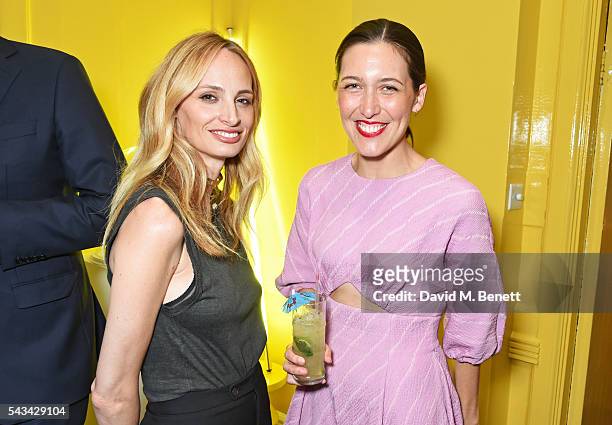 Lauren Santo Domingo and Emilia Wickstead attend a drinks reception and dinner in celebration of the Sabine Getty Showroom in Berkeley Square on June...