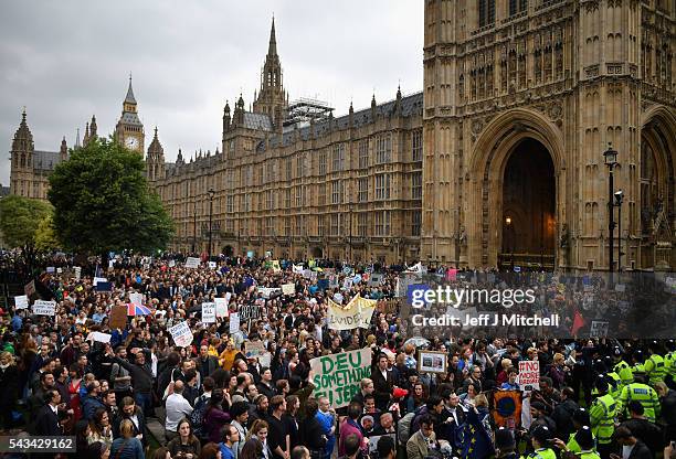 Protesters gather to demonstrate against the EU referendum result outside the Houses of Parliament on June 28, 2016 in London, England. Up to 50,000...