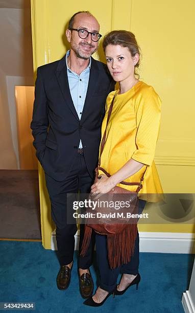 Gianluca Longo and Annabel Davidson attend a drinks reception and dinner in celebration of the Sabine Getty Showroom in Berkeley Square on June 28,...