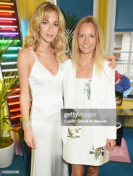 Sabine Getty and Martha Ward attend a drinks reception and dinner in celebration of the Sabine Getty Showroom in Berkeley Square on June 28, 2016 in...