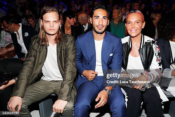 Wilson Gonzalez Ochsenknecht, Umut Kekilli and Natascha Ochsenknecht attend the Riani show during the Mercedes-Benz Fashion Week Berlin Spring/Summer...