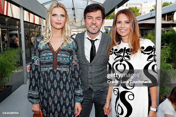 Tanja Buelter, Tobey Wilson and guest attend the Riani show during the Mercedes-Benz Fashion Week Berlin Spring/Summer 2017 at Erika Hess Eisstadion...