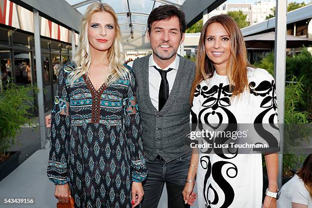 Tanja Buelter, Tobey Wilson and guest attend the Riani show during the Mercedes-Benz Fashion Week Berlin Spring/Summer 2017 at Erika Hess Eisstadion...