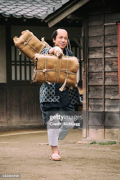 japanese man in edo period town - topknot stock pictures, royalty-free photos & images