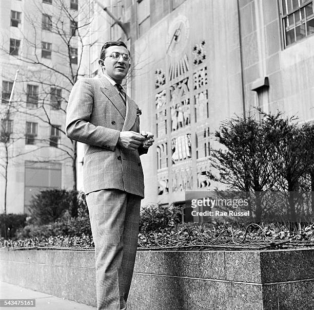 Portrait of a well dressed man visiting 30 Rockefeller Plaza, New York, New York, 1948.