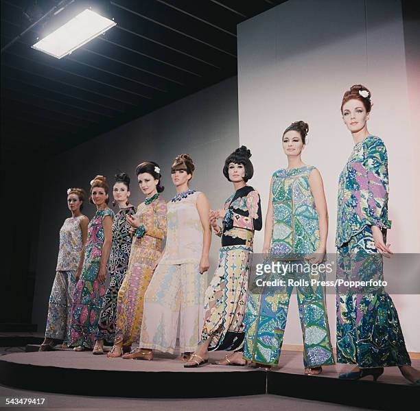 Sixties Fashion - View of young female models wearing assorted highly patterned and coloured beach wear by fashion designer Emilio Pucci at the...
