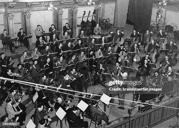 Wilhelm Furtwaengler conducting the Vienna Philharmonic. Wiener Musikverein. Vienna. About 1954. Photograph.