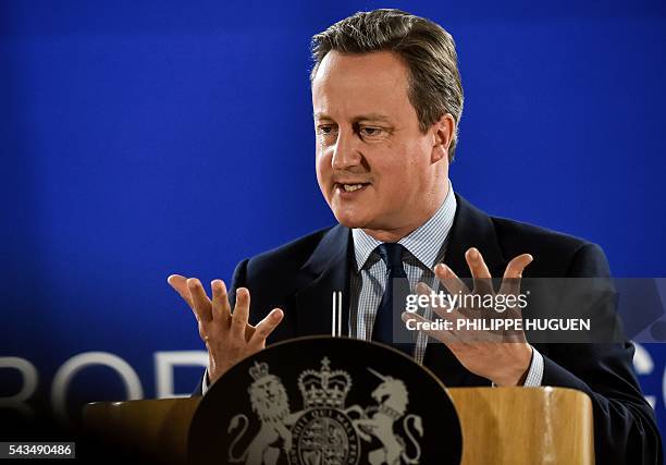 British Prime minister David Cameron gestures as he delivers a speech during a press conference during a European Union summit on June 28, 2016 at...