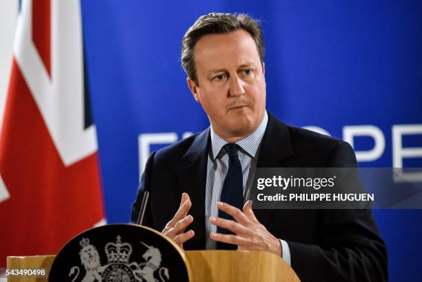 British Prime minister David Cameron gestures as he delivers a speech during a press conference during a European Union summit on June 28, 2016 at...