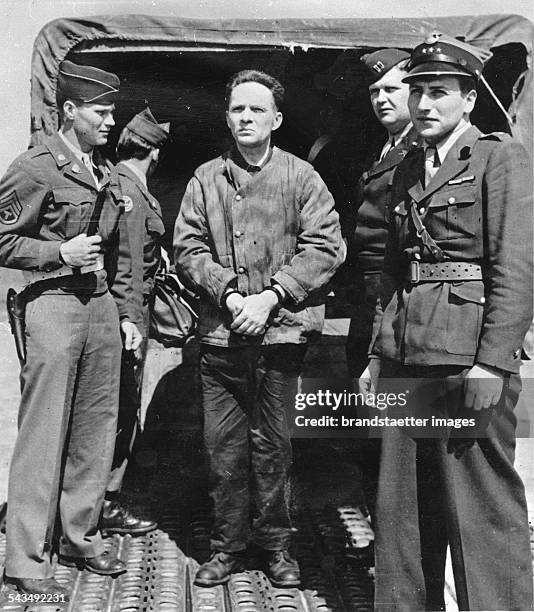 Nuremberg Trials. Former commandant of the concentration camp Auschwitz Rudolf Höss at the airport in Nuremberg. Germany. Photograph. 1946.