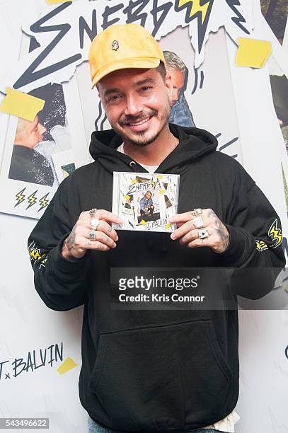 Singer J Balvin greets fans during a meet&greet at MamaJuana CafÃ© on June 27, 2016 in New York City.