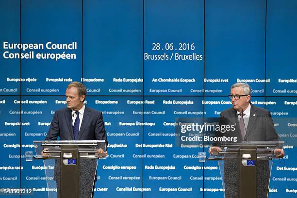 Jean-Claude Juncker, president of the European Commission, right, speaks during a news conference with Donald Tusk, president of the European Union ,...