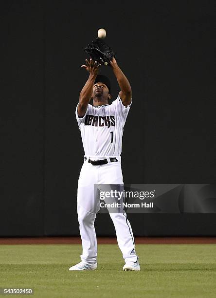 Michael Bourn of the Arizona Diamondbacks catches a fly ball off the bat of Carlos Ruiz of the Philadelphia Phillies during the second inning at...