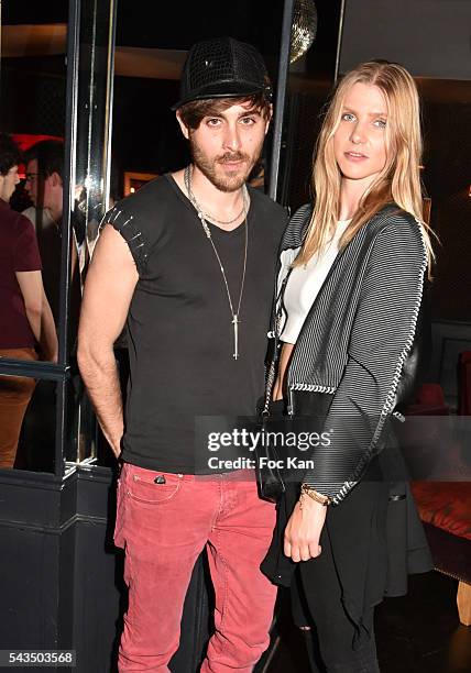 Nicolas Theil and model Cornelia Raviot attend the chacha club during the Henrik Vibskov Menswear Spring/Summer 2017 after show party as part of...