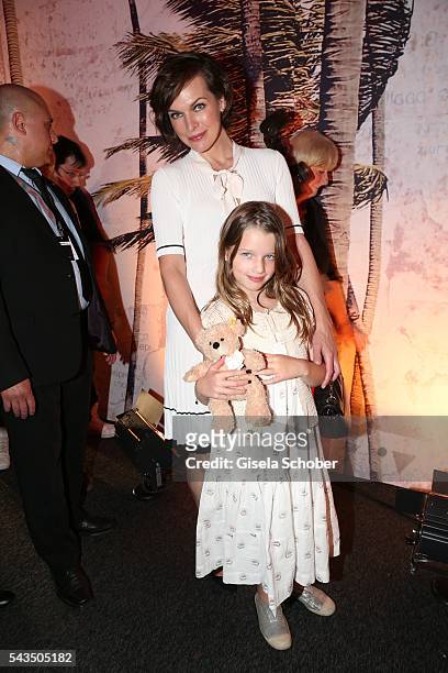 Milla Jovovich and her daughter Ever Gabo Anderson during the Marc Cain fashion show spring/summer 2017 at CITY CUBE Panorama Bar on June 28, 2016 in...