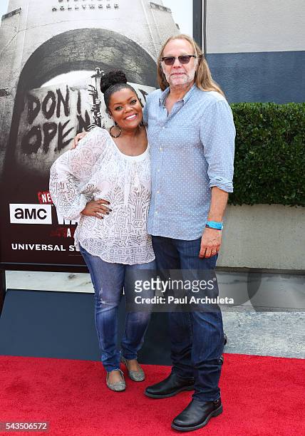 Actress Yvette Nicole Brown and Producer Greg Nicotero attend the press event for "The Walking Dead" attraction "Don't Open, Dead Inside" at...