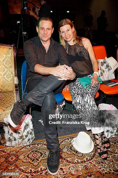 Sascha Vollmer and his partner Jenny attend the Marc Cain fashion show spring/summer 2017 at CITY CUBE Panorama Bar on June 28, 2016 in Berlin,...