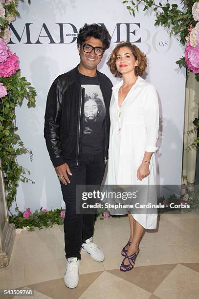 Host Sebastien Folin and his wife Ketty attend the 'Air France Madame' 30th Anniversary at Le Ritz Hotel, on June 28, 2016 in Paris, France.