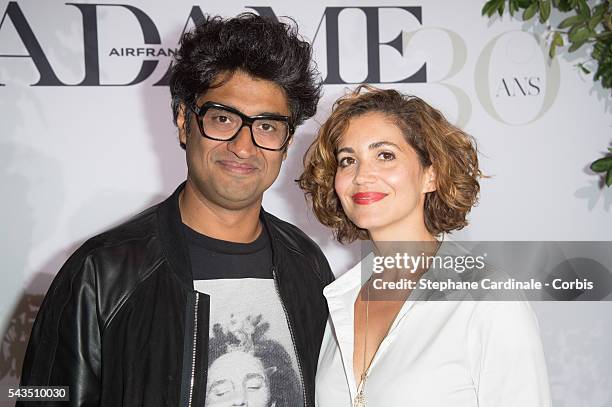 Host Sebastien Folin and his wife Ketty attend the 'Air France Madame' 30th Anniversary at Le Ritz Hotel, on June 28, 2016 in Paris, France.